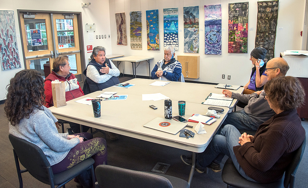 Shannon Cowan (Salt Spring Foundation), Mike Charlie, James Charlie, Myrus James, Alison Bain (Fernwood School), Phil Vernon and Maggie Ziegler meet at the Salt Spring Library, November 2021.